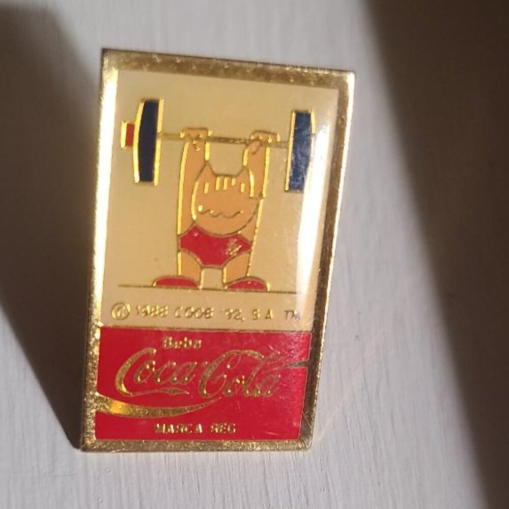 Barcelona Olympics 1992 Coca Cola Weightlifting Lapel Pin - Olympic Cobi Mascot